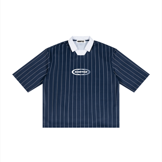 Front flat lay of navy blue pinstripe collared shirt with KORTEZ logo