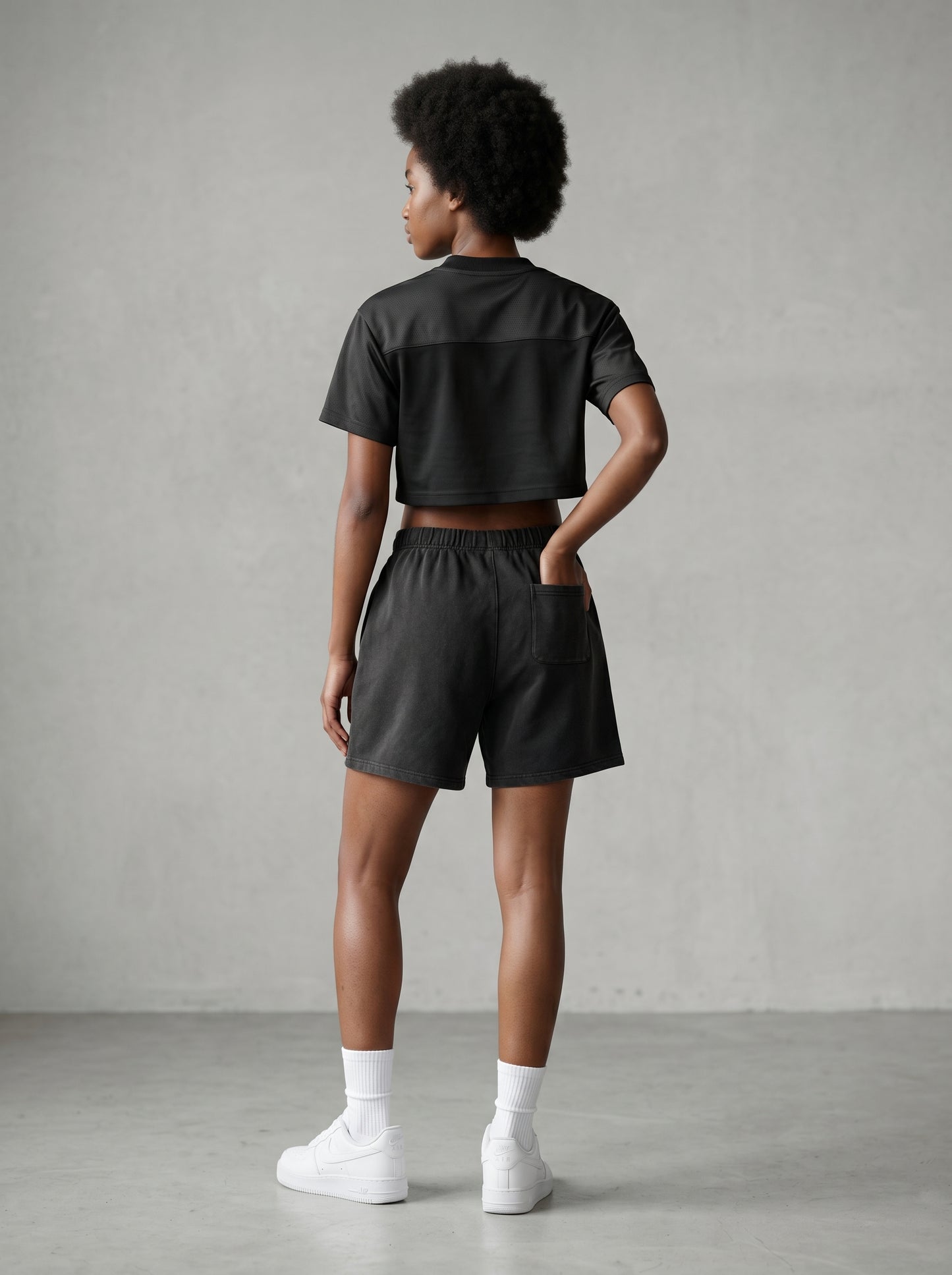 KORTEZ - Cropped Paneled V-Neck Jersey / Black