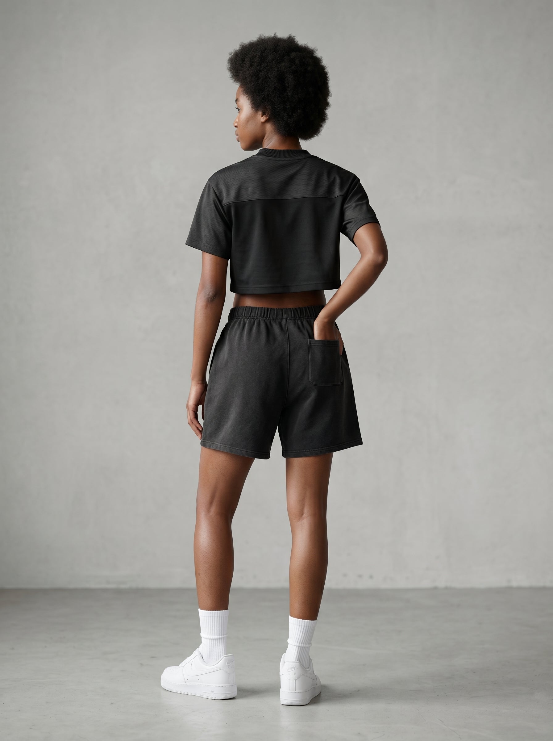 KORTEZ - Cropped Paneled V-Neck Jersey / Black